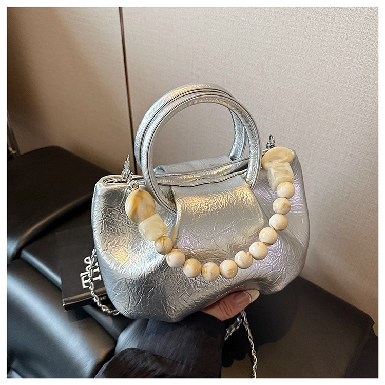 A stylish and trendy beaded bag for women, a new summer chain crossbody cloud bag for women in 2025 undefined