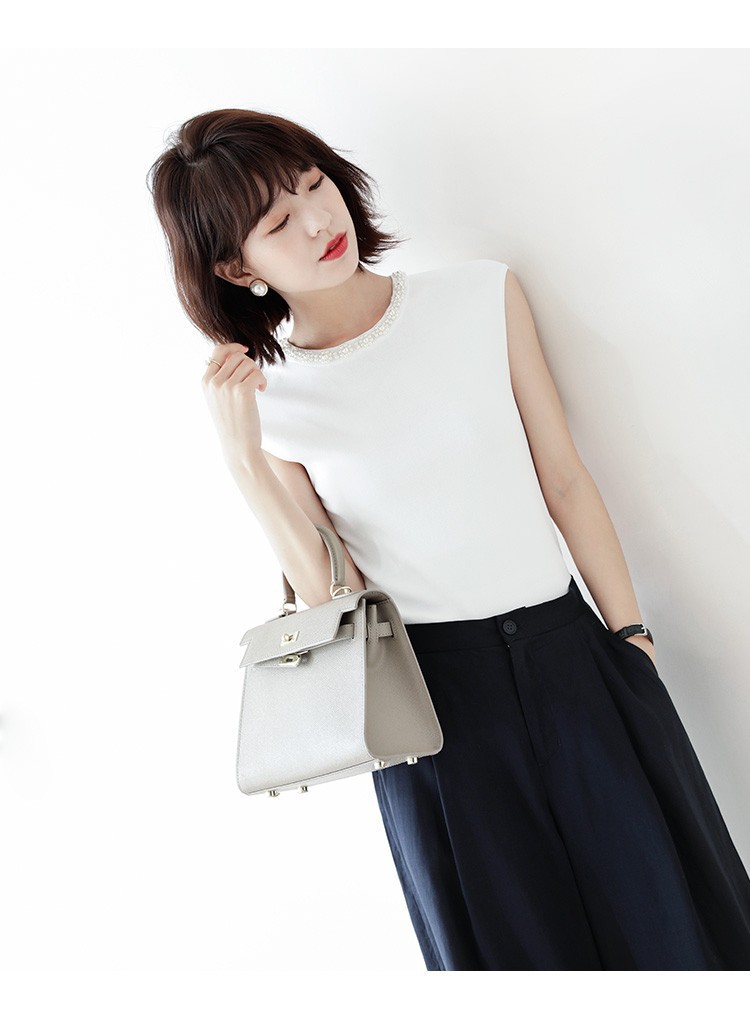 Elegant solid color knitted sweater sleevless