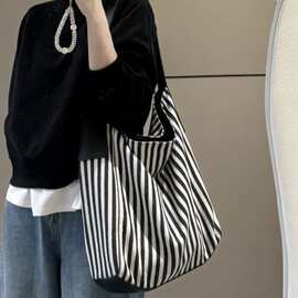 大容量托特包包女式2025新款百搭帆布条纹通勤单肩包女休闲腋下包