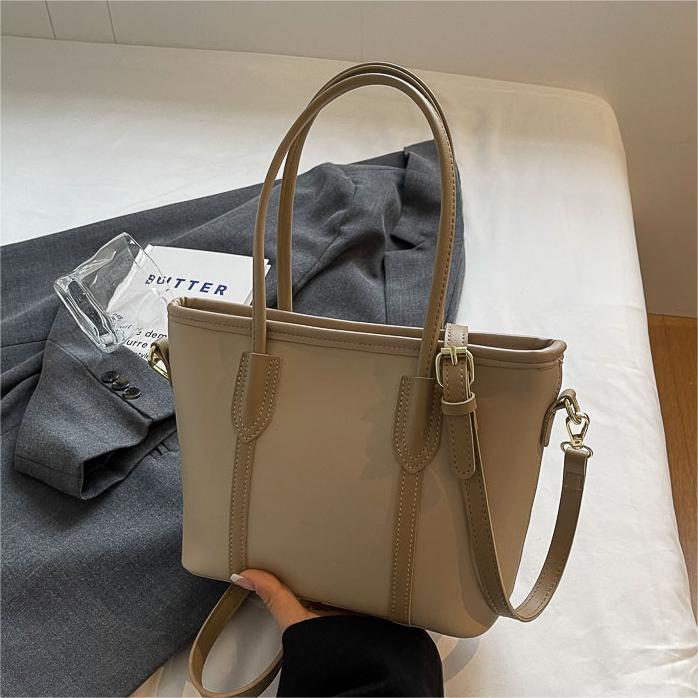 Bolso de mano de tendencia coreana para mujeres verano 2024 nuevo tipo de bolso de hombro para viajar al trabajo bolso de cubo de gran capacidad