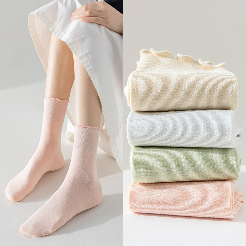 Calcetines de algodón de color sólido para mujeres verano en una máquina sin costuras de hueso envasado independiente calcetines de mujer al por mayor