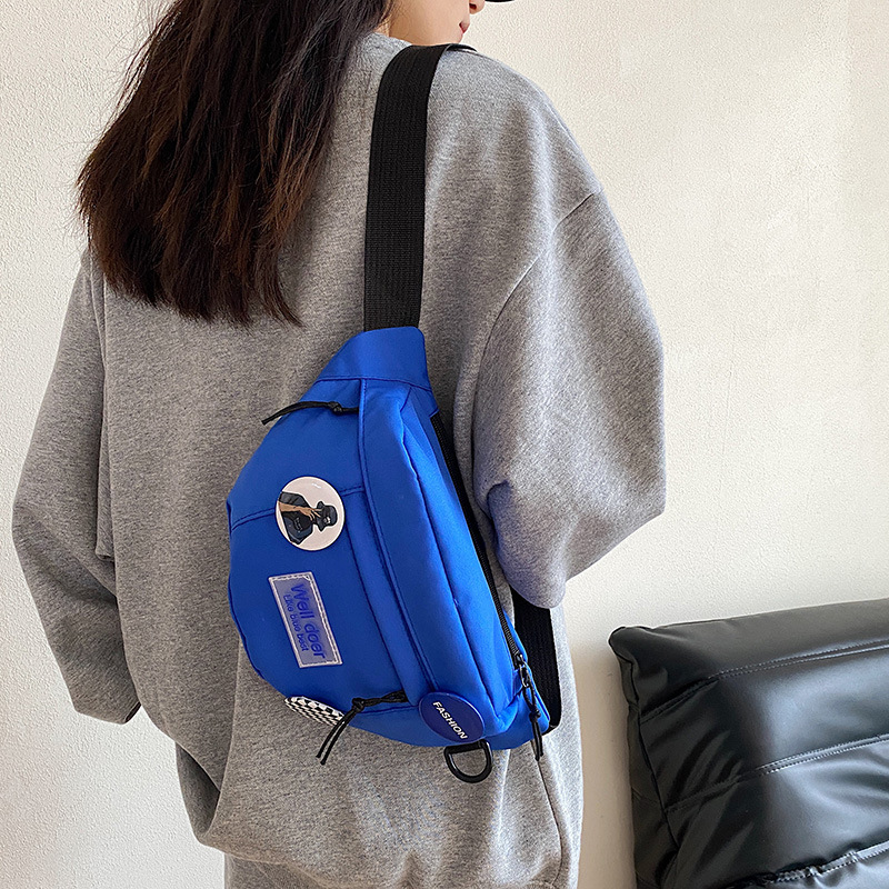 Marca de moda bolso de pecho japonés de los hombres ins bolso de hombro simple bolso de la cintura mochila bolso de hombro pequeño bolso de mensajero de estudiante simple de las mujeres