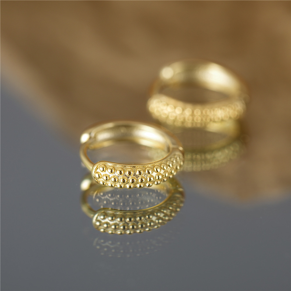 Nueva moda innovadora europea y americana ins estilo s925 plata esterlina clavo falso punto clásico oído anillo hebilla pendientes