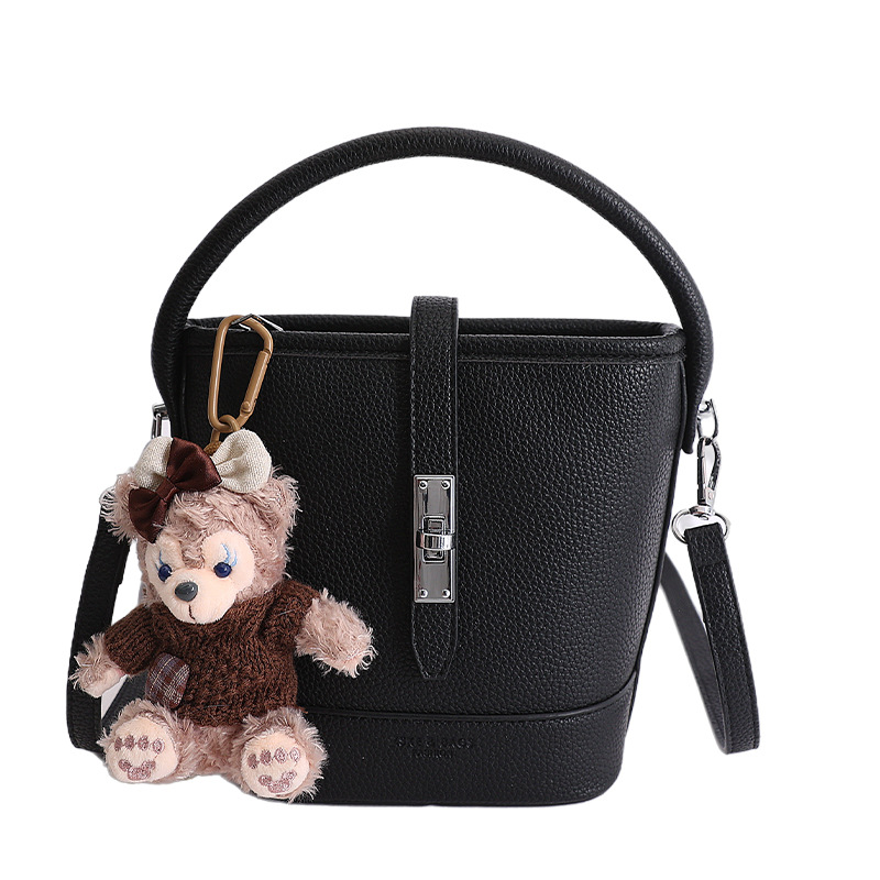 Litchi estampado bolso de cubo de mano mujer 2026 venta caliente nueva moda coreana alta textura mochila de hombro