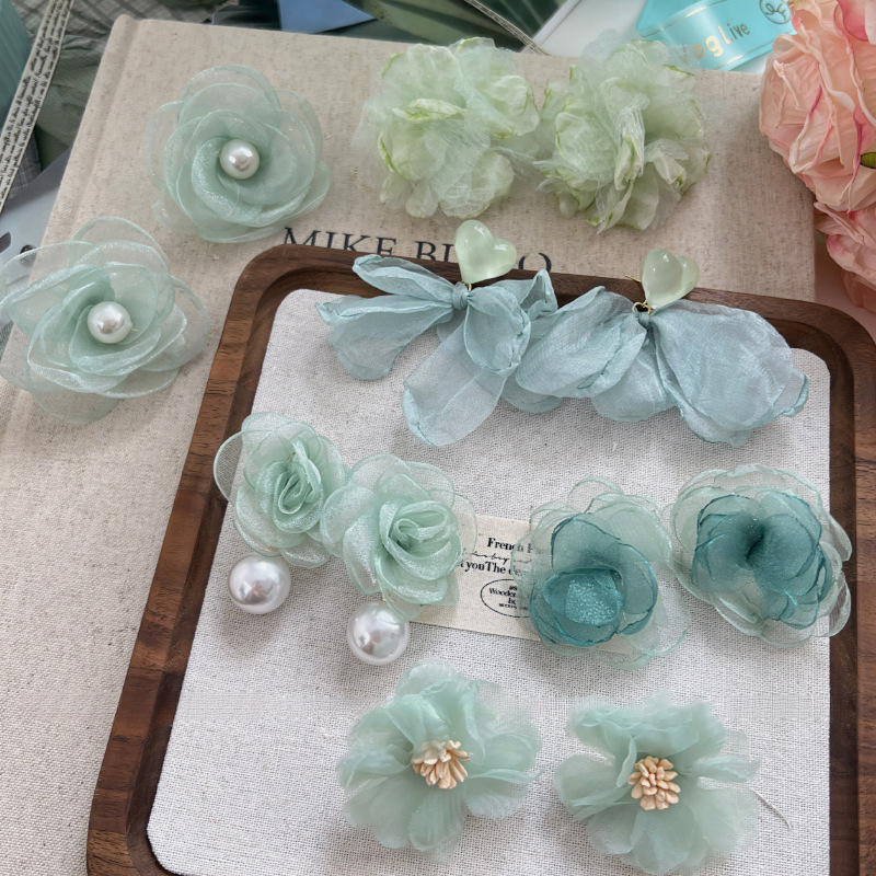 Pendientes de borla de flor de súper hada de plata Pendientes de ins pequeños frescos y dulces Personalidad de moda Pendientes de alta gama al por mayor