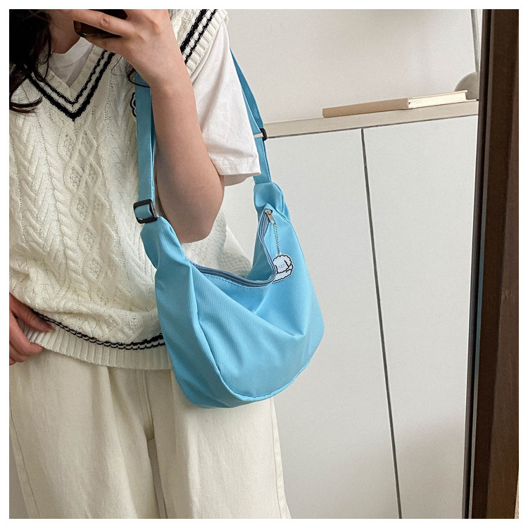 Large capacity canvas shoulder for women in spring summer 2023, new solid color, simple and fashionable casual bag,_voghion.com