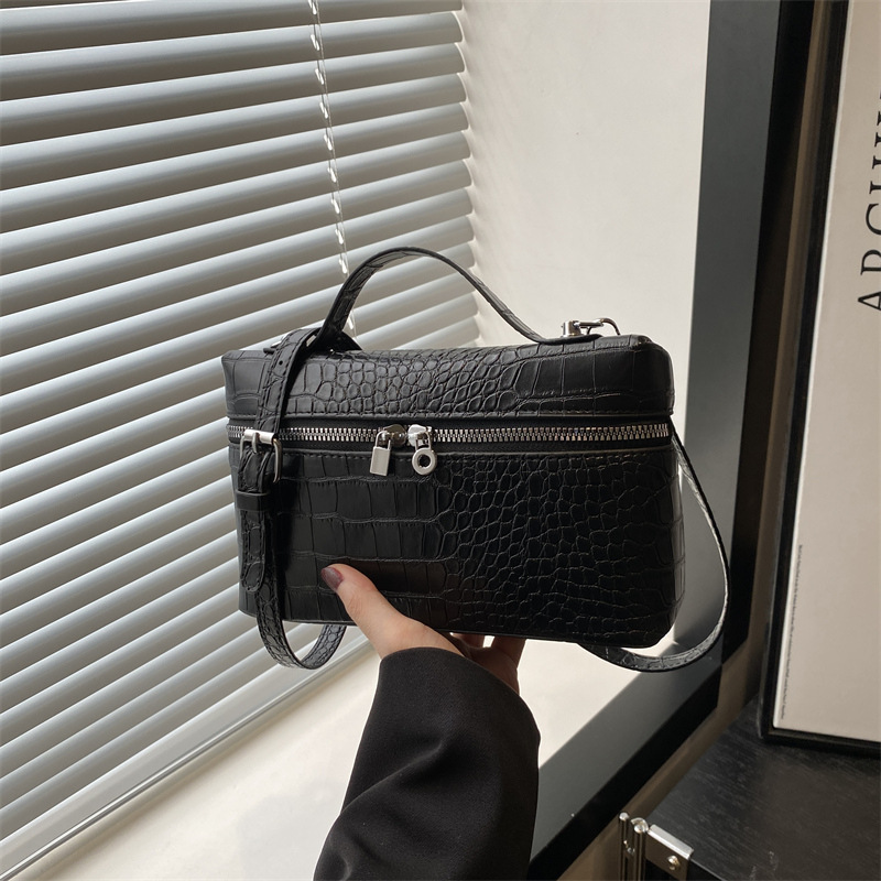 2025 textura simple bolso pequeño portátil nuevo bolso cuadrado pequeño de moda de moda bolso de mensajero de paso de alta gama