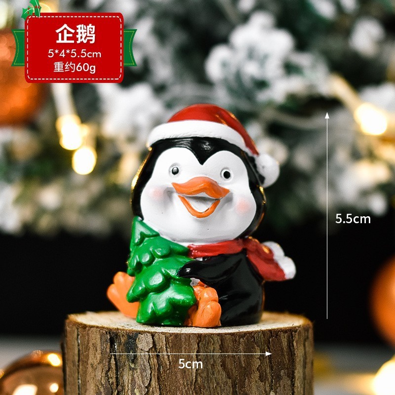 クリスマスの樹脂のデスクトップの置物は彼女にプレゼントします。|undefined