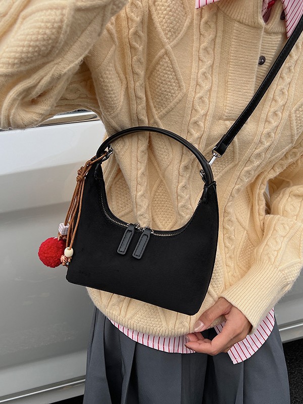 2025 nueva textura bolsas de brazo mujeres otoño de alto nivel bolsas de mano de nicho bolsas de mano coreanas bolsas de饺os versátiles