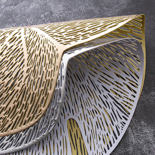 Wholesale coasters with cross-border creative design, irregular gold and silver plated, light luxury Nordic table mats, heat-insulating PVC coasters