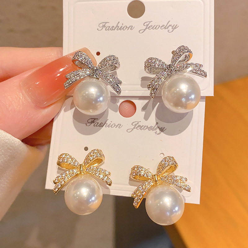elegant copper universal sophisticated earrings with bow with zircon