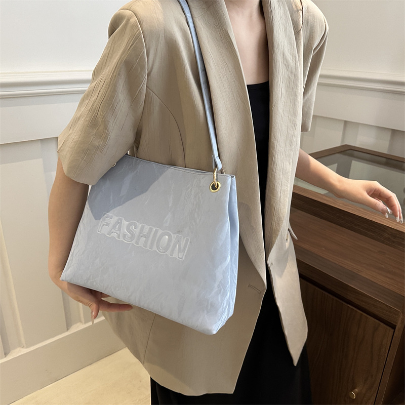 Bolsa plegable de gran capacidad para mujeres 2024 nuevo bolso de verano popular bolsa de viaje de hombro