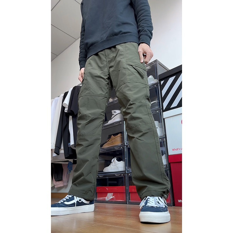 Venta al por mayor pantalones de asalto de caparazón suave estadounidense de estilo fino para hombres pantalones de secado rápido con función de tala de primavera y otoño