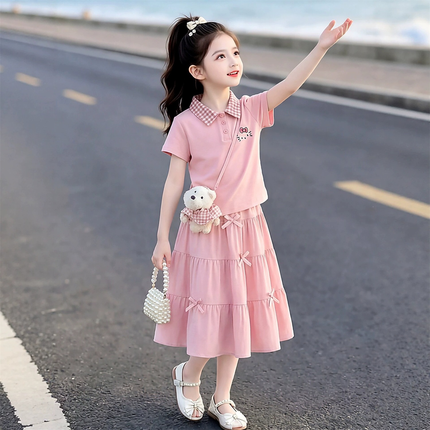 Korean style trendy girls' skirt, new summer style, cute and casual short-sleeved two-piece set for little girls.