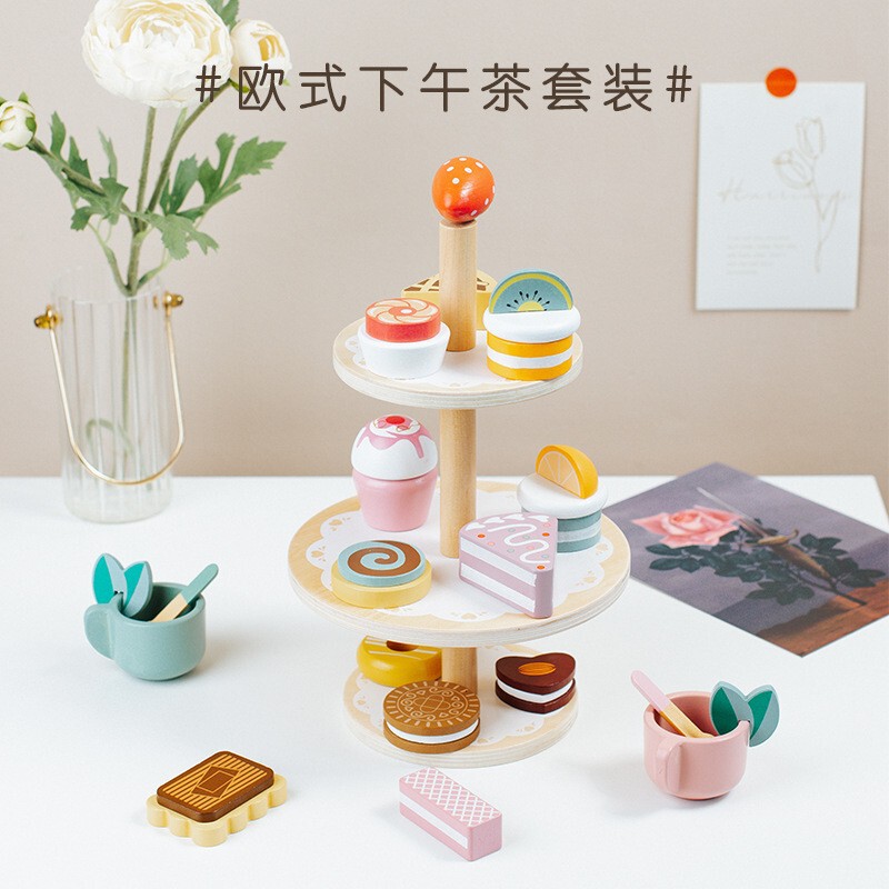 国境を越えた子供たちが昼寝をしているケーキは、トースターコーヒーマシン茶器セット木製玩具を販売している|undefined
