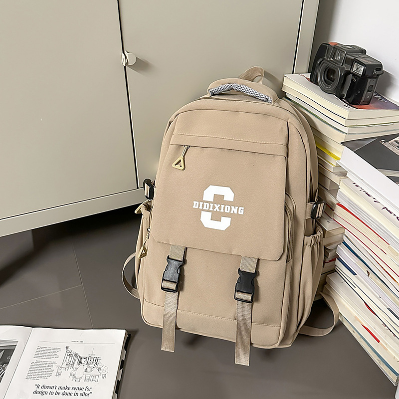 Mochila escolar para estudiantes universitarios masculinos, mochila de gran capacidad para estudiantes de secundaria y secundaria, mochila de pareja con solapa de marca de moda