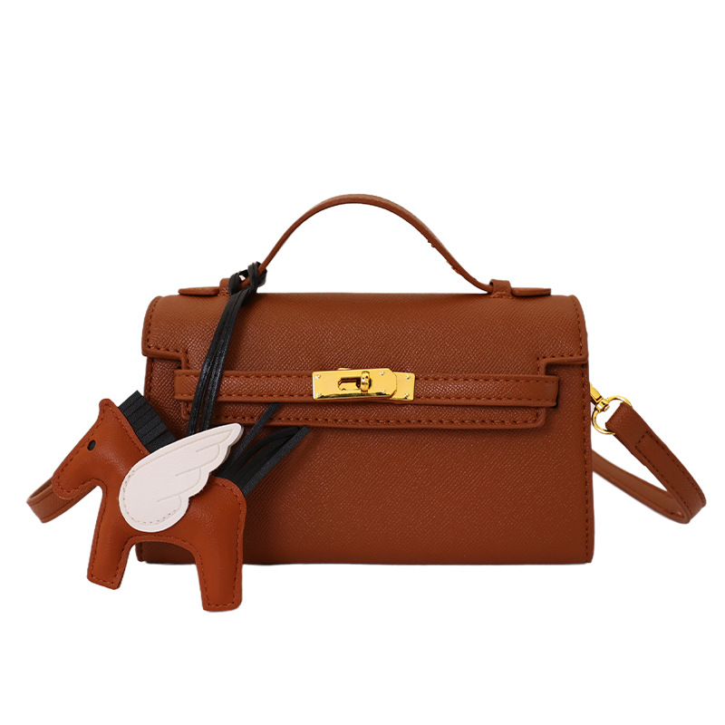 Texturas bolsos Kelly mujeres 2026 verano nuevo estilo de moda simple mochila diaria bolso de mano super caliente bolso pequeño image 13