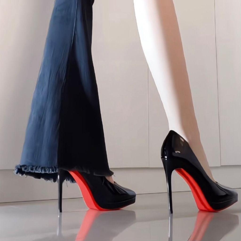 Black high heels with extremely high heels