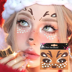 クロスボーダーのクリスマスの鹿の顔は新年のクリスマスのカーニバルの祝日のパーティーの舞台で顔の化粧を披露します。