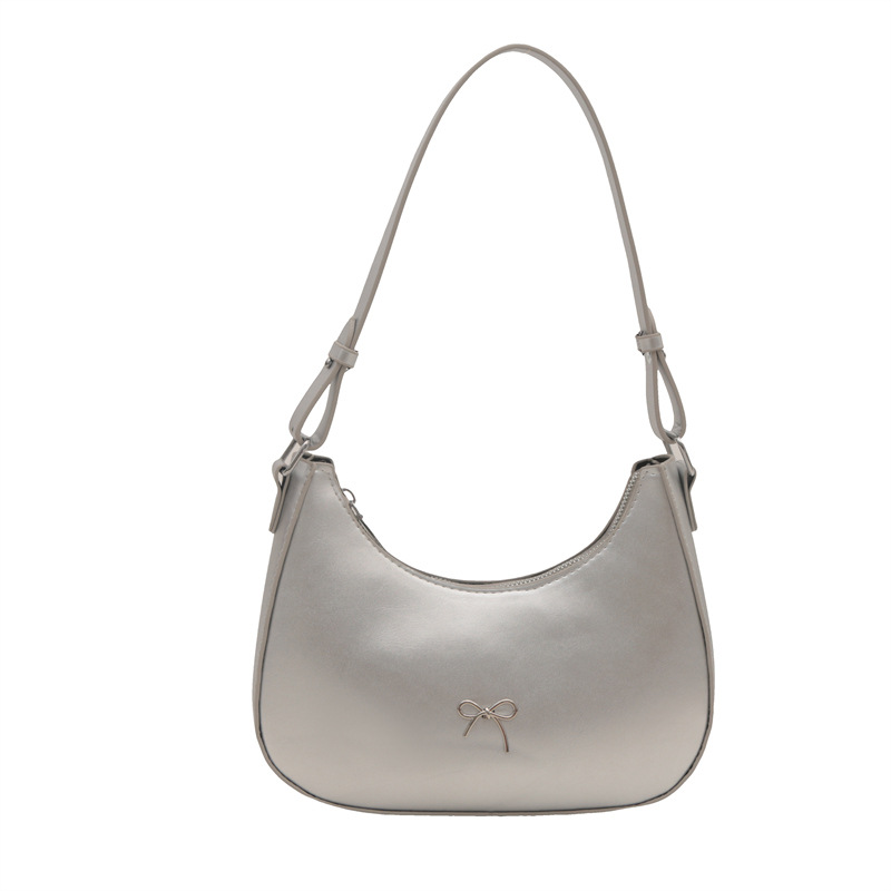 Bolso de axila con lazo para mujer 2024 nuevo estilo literario minimal bolso de hombro textura de viaje de moda de luna nueva marea