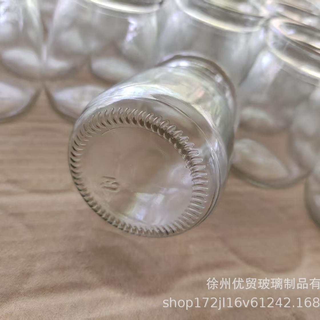 Venta al por mayor botella de pudín de vidrio de 100ml taza de leche gruesa botella de yogur resistente a altas temperaturas botella de vidrio de corcho