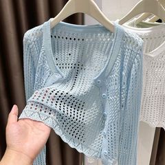 怠惰な風の透かし彫りの純色の日焼け止めのカーディガンの上着の女性2025夏の丸首のゆったりしている薄いタイプのニットのエアコンのブラウス