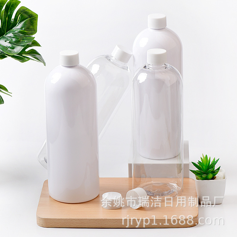 1000mlの丸い肩のPETのペットボトルの普通の蓋の純粋な露の瓶の入浴剤のシャンプーの体の乳の洗浄の瓶|undefined