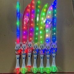 New Glow-in-the-Dark Rabbit Sword Projector Sound Light Sword Flash Spray Paint Sword Shark Knife Music Toys for Boys and Girls from Stalls
