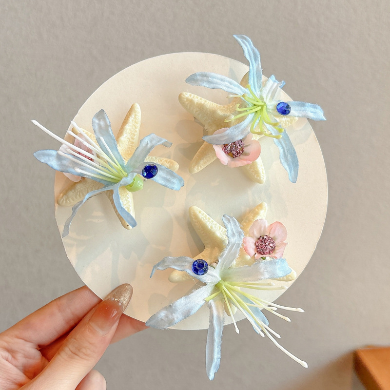 Ocean Series Sea Star Flower Horquilla Sweet Girl Hot Girl Super Fairy Clip lateral Tour de playa Ambiente de vacaciones Tocar tarjeta de fotos