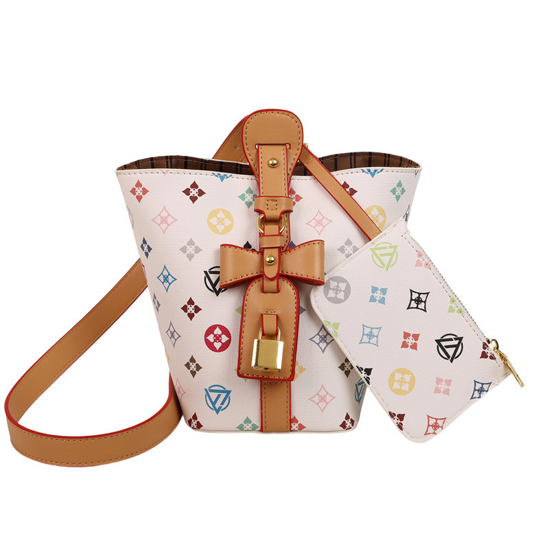Bolso de cubo retro estilo Hong Kong 2025 verano nuevo bolso femenino personalidad bowknot bandolera moda contraste color bandolera