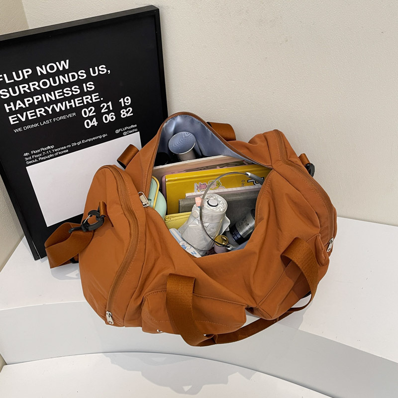 Bolsa de viaje de gran capacidad de textura retro bolso de almohada de moda 2025 nuevo bolso de hombro universal bolso de viaje