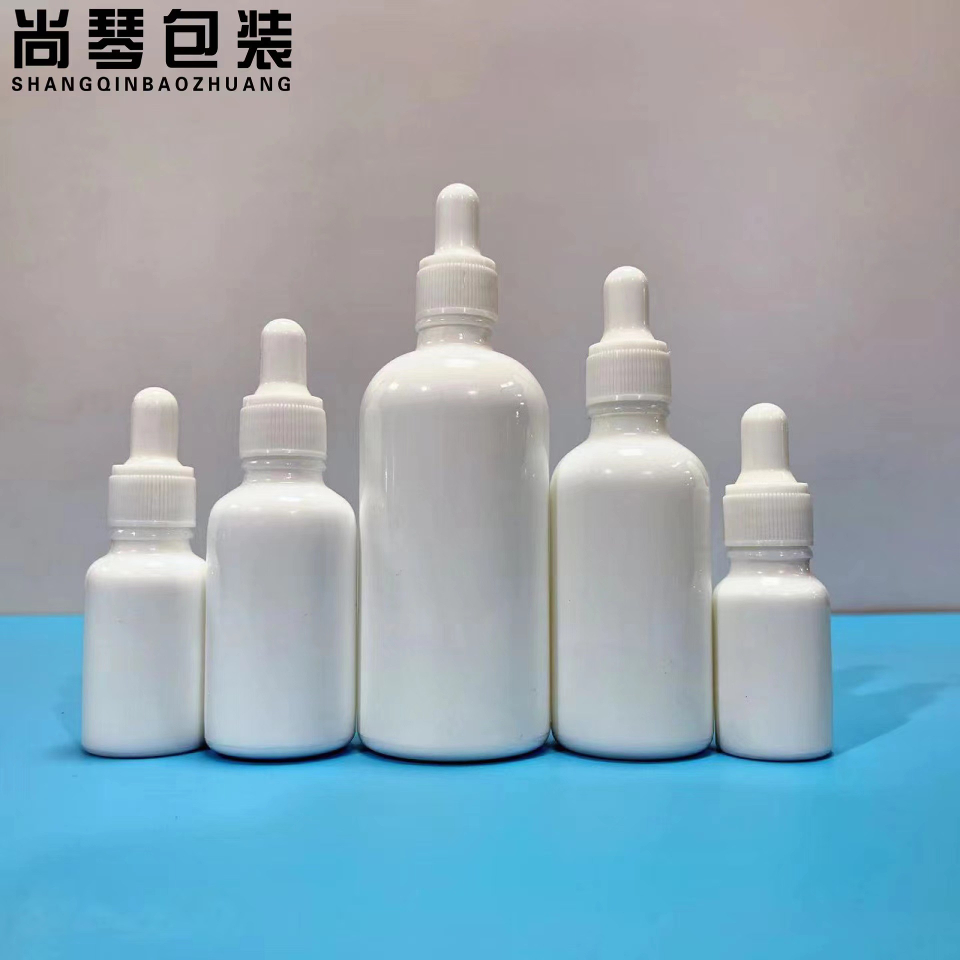 En stock botella de aceite esencial de porcelana blanca de 30ml 10ml20ml botella blanca de porcelana de alta gama 50ml botella gotero líquido de esencia blanca