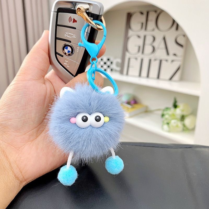 Suministro de nuevos lindos dibujos animados elfos de carbón pequeño colgante de pelusa colgante llavero de automóvil bolso colgante