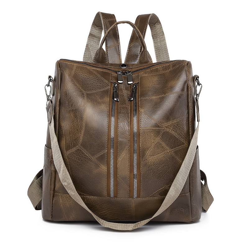 Comercio exterior al por mayor 2023 nueva mochila de cuero suave para mujer retro simple y versátil mochila de viaje multifuncional mochila escolar