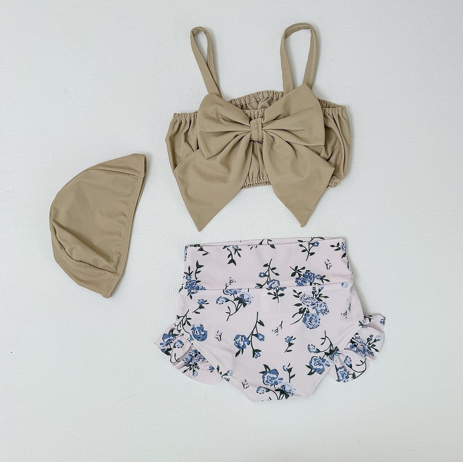 韓国版の夏の新型子供服の乳幼児の花のワンピースの水着の女性の赤ちゃんのかわいい大きい蝶結びの洋風の水着