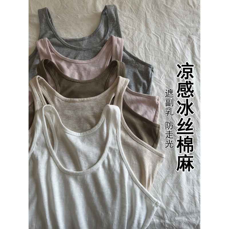 It's simply gorgeous! A white, simple, loose-fitting camisole for women, perfect for an effortlessly relaxed look