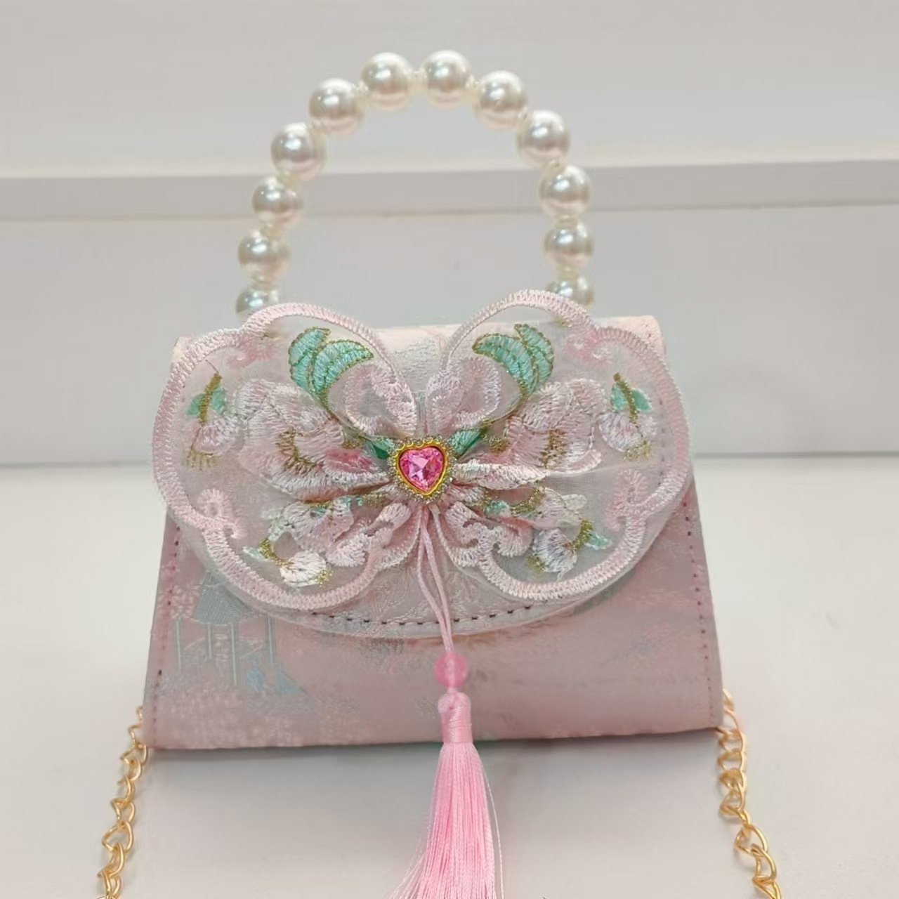 Bolsos de perlas de arco de estilo nacional, bolsos de cadena de princesa, bolsos de ropa antigua, accesorios para niños, bolsos de regalos para niñas
