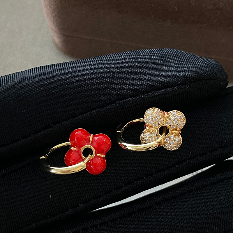 Flower pearl earrings with a unique design for the Chinese New Year. Exquisite autumn and winter earrings. New Year's festive red earrings