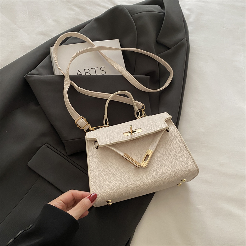 Nicho de alta sensación simple bolso de mano mujer 2024 nueva moda versátil bolso Kylie de moda bolso pequeño