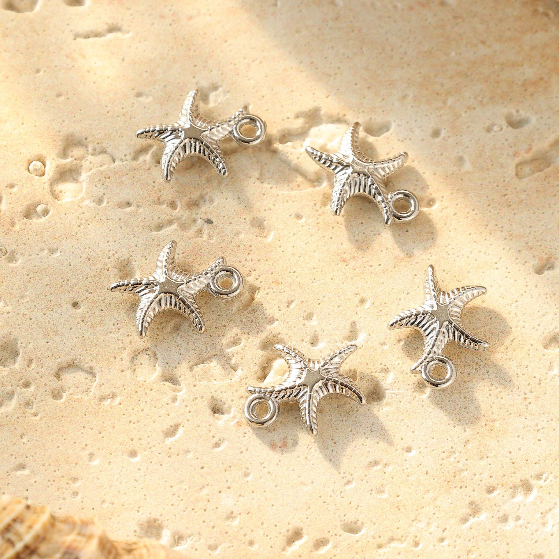 10 PCS/Package Quantity 304 Stainless Steel Material Starfish Pattern 10 PCS/Package 304 Stainless Steel Starfish Pendant