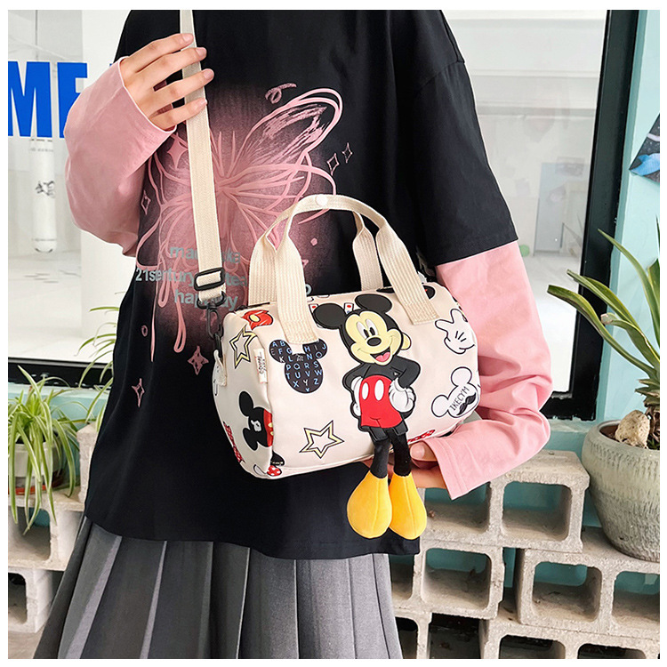 In 2024, the best-selling children's bags will feature cute Mickey Mouse-patterned bowling bags for girls, casual hand-held shoulder bags, and a unique style undefined
