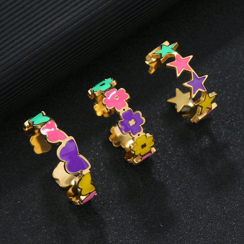 Joyas de acero inoxidable transfronterizas frescas gotas de aceite de color estrella de pentaco flores mariposa dopamina abierta anillo de acero de titanio