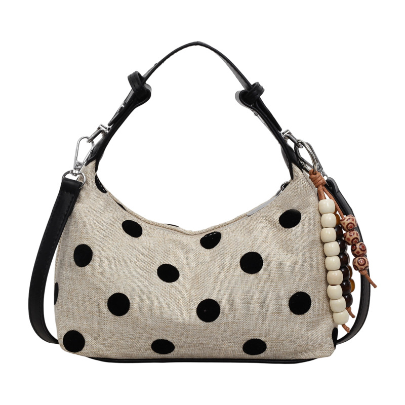 Bolsa de mano de lino ultra caliente, punto de onda, mujer 2026 nuevo nicho Zhongxiao universal, mochila de hombro para viajar