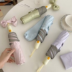 純色の色のゴムの丸い角の3つ折の自動節は日よけを収めて紫外線の日傘の女性を防ぎます。