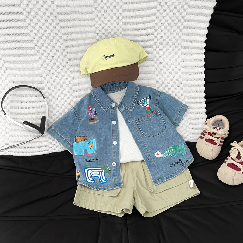Camisas creativas coreanas de dibujos animados para niños graffiti vaqueros para bebés de verano sueltas camisas de moda de manga corta para bebés