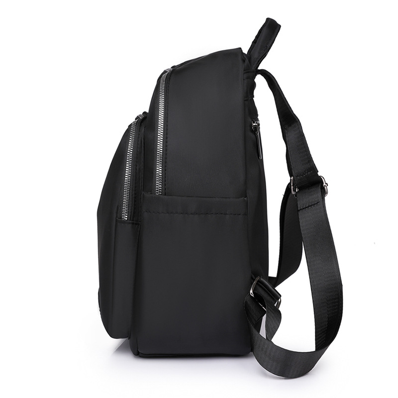 Fábrica al por mayor 2023 nueva mochila de nailon para mujer coreana simple mochila de viaje urbano mochila escolar de moda