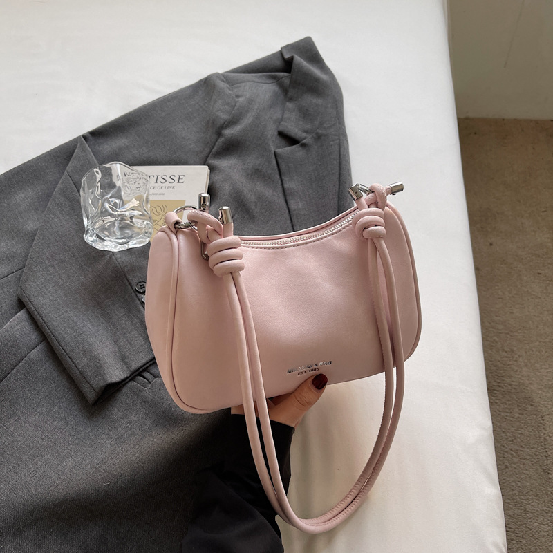 Bolsa de brazo de moda retro para mujeres 2026 primavera nueva simple diaria bolsa de bolsas de bolsillo de alto valor coreano hombro único