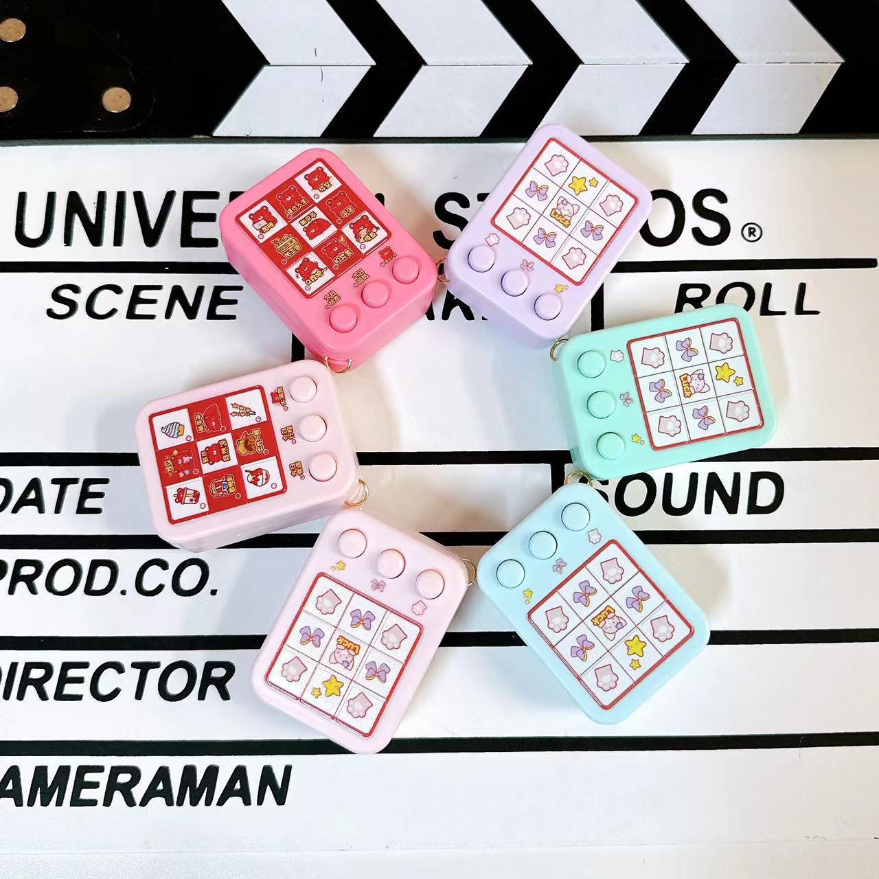 Cross-border fruit lottery machine lucky game machine keychain bag ornaments fun flash toy gift wholesale