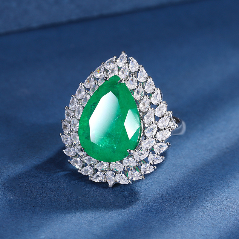 Zhuang Sheng joyería cobre inferior oro plateado traje europeo y americano simulación color tesoro gota de agua diamante anillo colgante 13*18