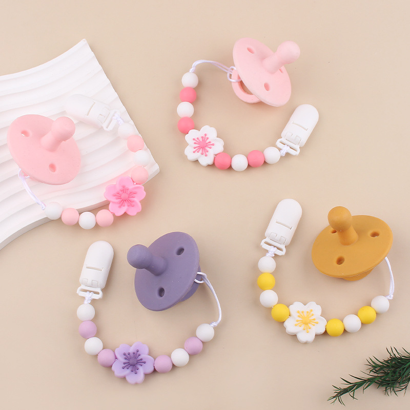 Productos para bebés Clip de chupete de plástico de bricolaje para bebés Flor de begonia creativa gel dental de silicona Chupete anti-caída de la cadena